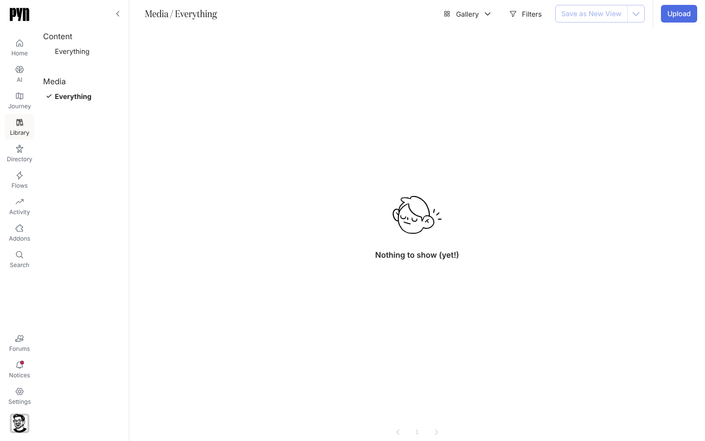 The Library's Media view, Everything, with the Upload button at the top right and no uploads listed.