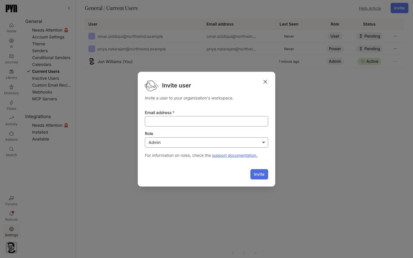 The Invite user dialog with an Email address field and a Role select.